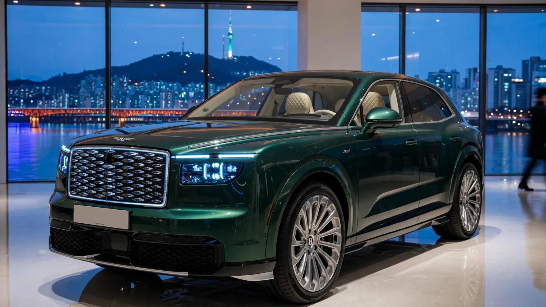 SUV eléctrico Bentley Torcal S verde oscuro expuesto en un salón de Seúl al atardecer, visto desde abajo